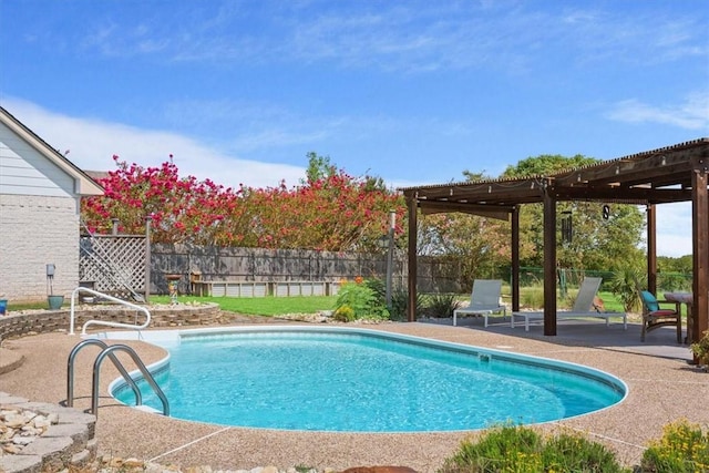 view of pool with a pergola and a patio area