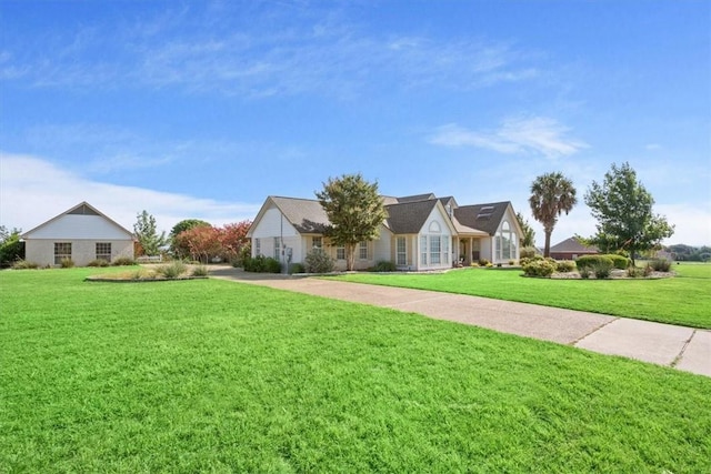 view of front of property with a front lawn