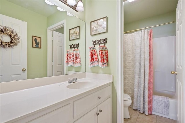 full bathroom with toilet, vanity, tile patterned floors, and shower / bath combo with shower curtain