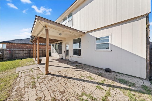 rear view of property with a patio area