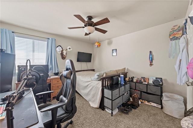 bedroom featuring ceiling fan and carpet floors