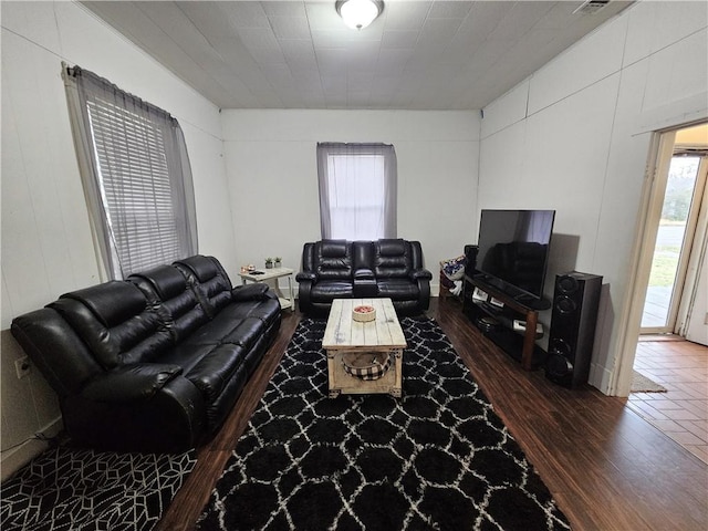 living room featuring dark hardwood / wood-style floors