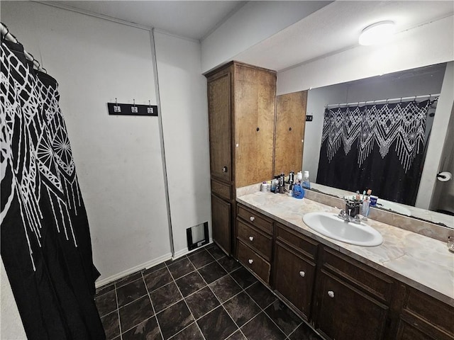 bathroom with vanity and tile patterned floors