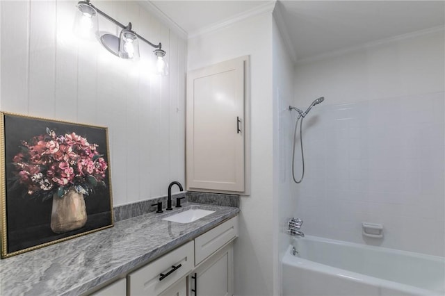 bathroom featuring vanity, ornamental molding, and shower / tub combination