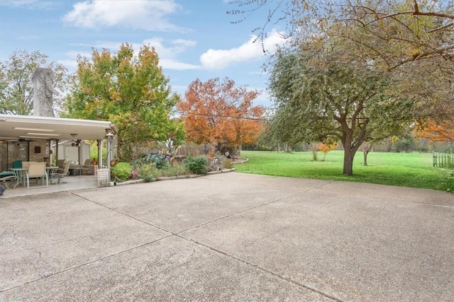 view of patio / terrace featuring ceiling fan