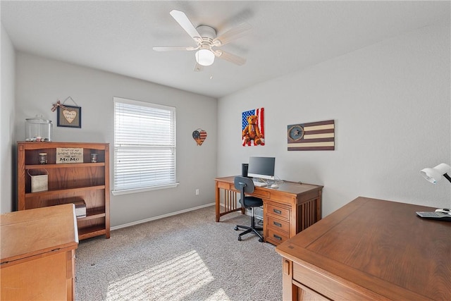 office space with ceiling fan and light colored carpet