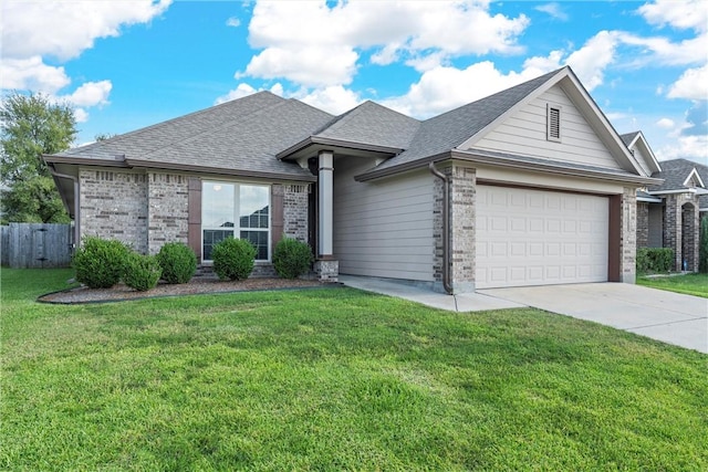 single story home with a front yard and a garage