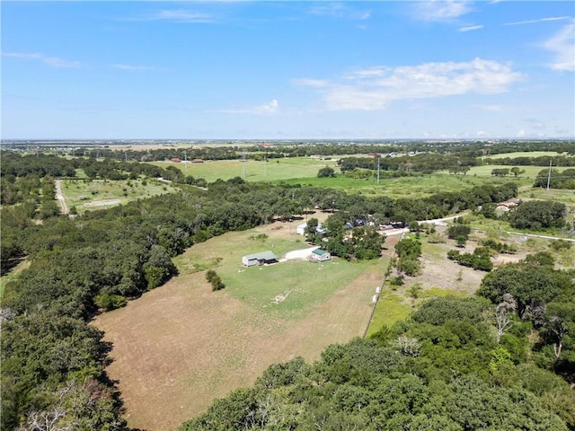 birds eye view of property with a rural view