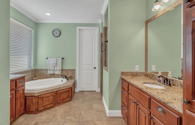 bathroom featuring tile patterned floors, a washtub, and vanity