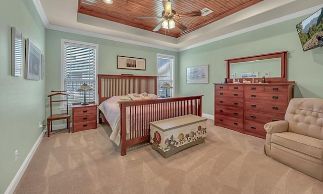 bedroom featuring wood ceiling, light colored carpet, a raised ceiling, ceiling fan, and crown molding