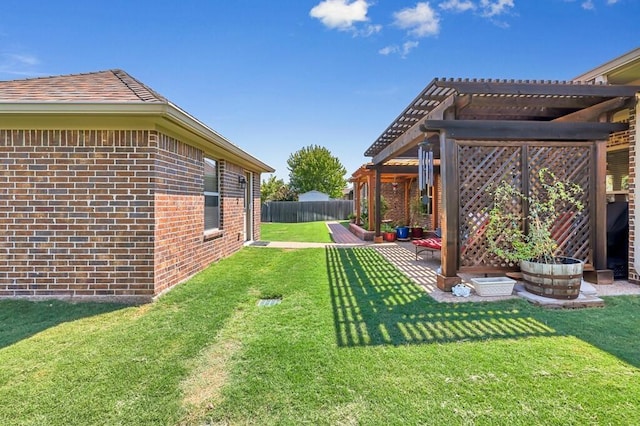 view of yard featuring a patio area and a pergola