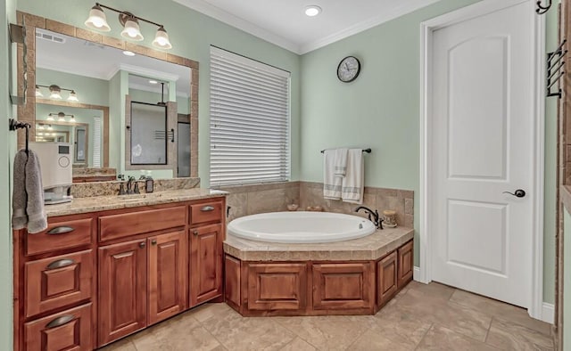 bathroom featuring vanity, a bathtub, and crown molding