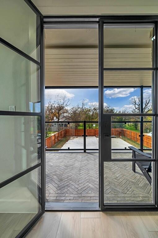 entryway featuring hardwood / wood-style flooring and a wealth of natural light