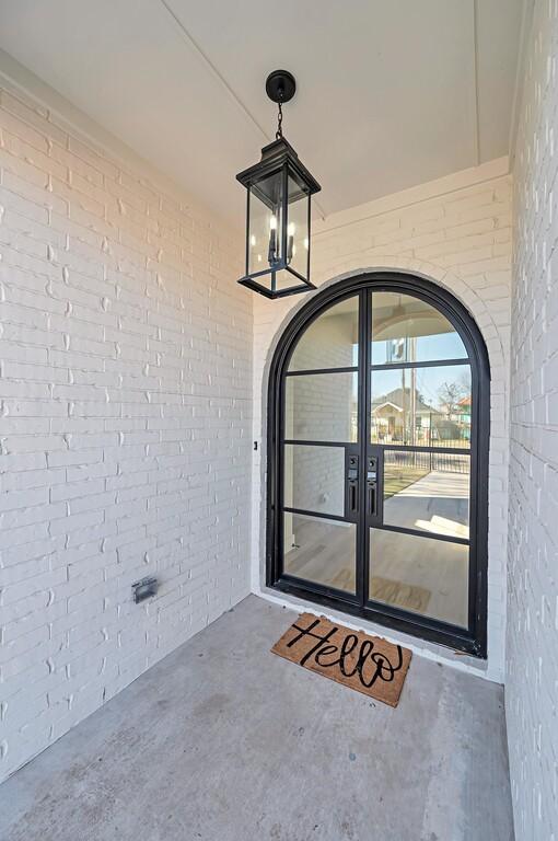 entrance to property featuring french doors