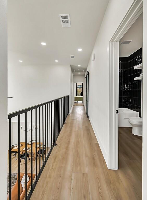 hall featuring hardwood / wood-style flooring