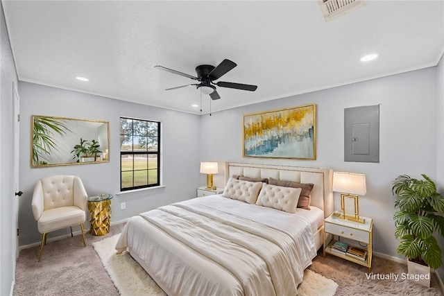 carpeted bedroom featuring electric panel and ceiling fan