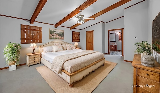 carpeted bedroom with ceiling fan, ensuite bathroom, and lofted ceiling with beams