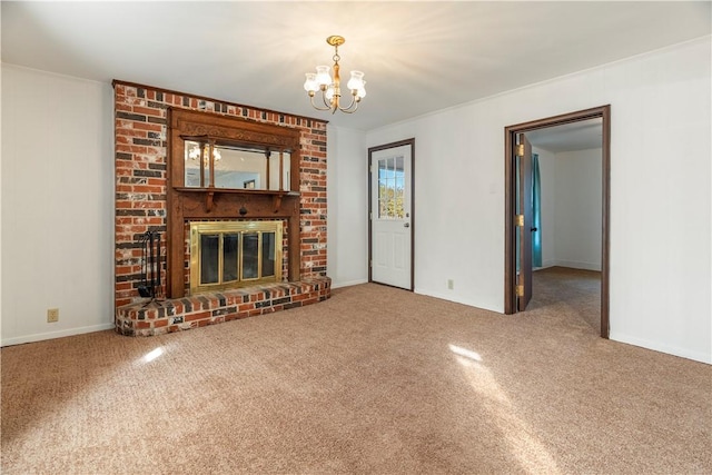 unfurnished living room featuring a fireplace, carpet floors, and a notable chandelier