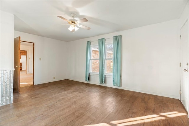 unfurnished room with light hardwood / wood-style floors and ceiling fan