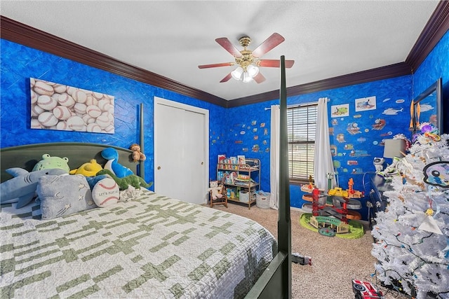 carpeted bedroom featuring a textured ceiling, ceiling fan, and ornamental molding