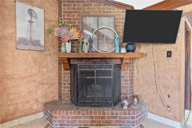 details with crown molding and a brick fireplace