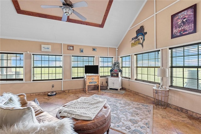 interior space featuring ceiling fan and vaulted ceiling