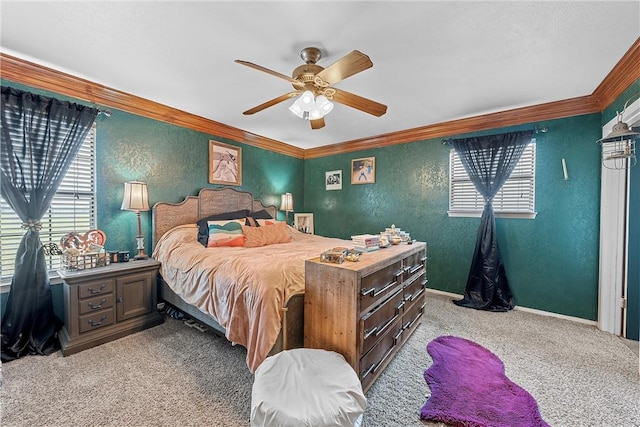 carpeted bedroom with multiple windows, ceiling fan, and crown molding