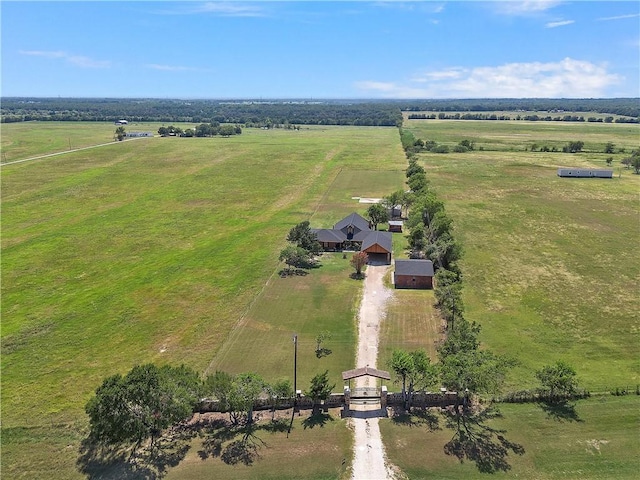 birds eye view of property featuring a rural view