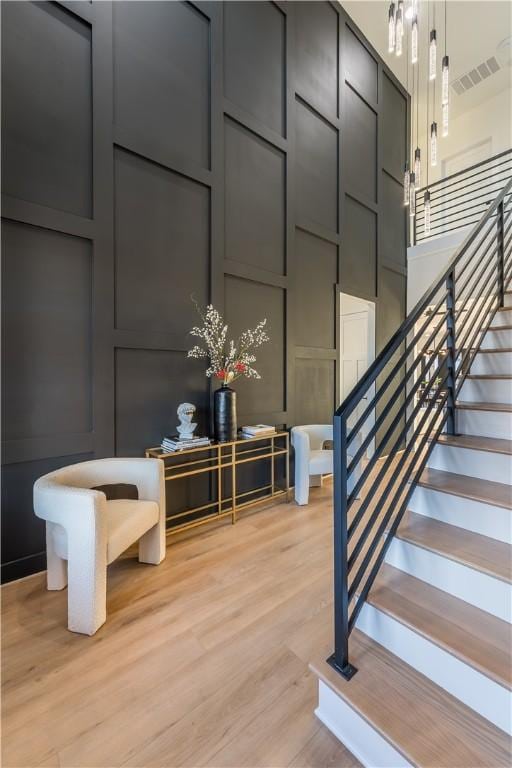 staircase featuring hardwood / wood-style floors