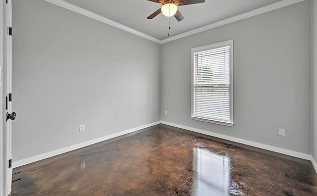 empty room featuring ceiling fan and crown molding