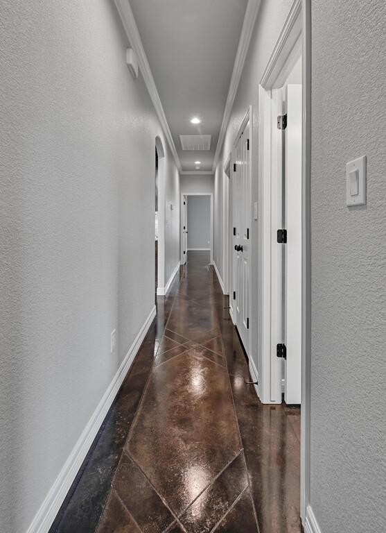 hallway with crown molding