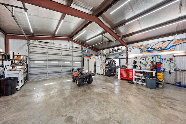 garage with a workshop area