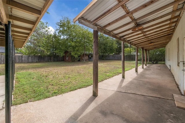 view of patio / terrace featuring a storage shed