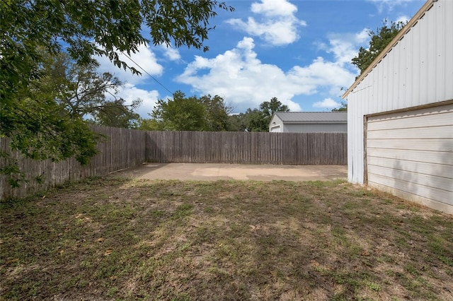 view of yard with a patio area