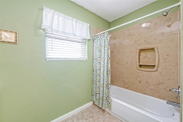 bathroom featuring tile patterned floors, shower / bathtub combination with curtain, and a textured ceiling