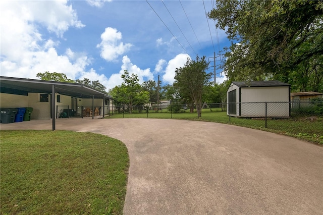 exterior space featuring a yard and an outdoor structure