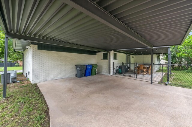 view of patio / terrace featuring a carport and central air condition unit