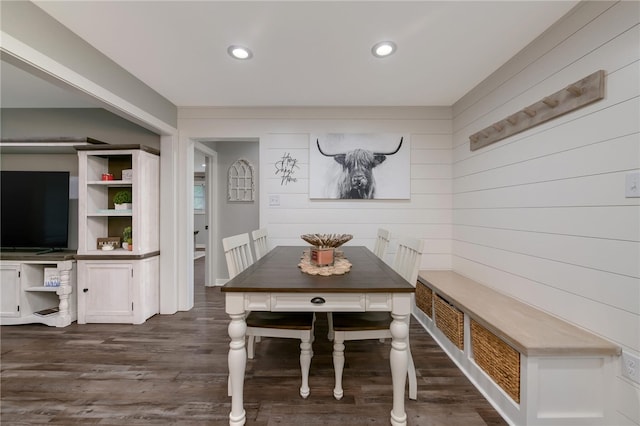 unfurnished dining area with dark hardwood / wood-style flooring