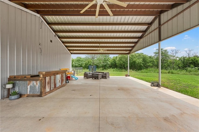 view of patio featuring ceiling fan