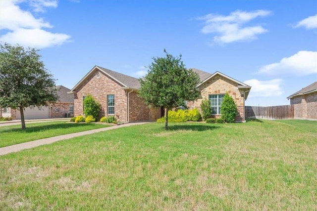 ranch-style house with a front yard