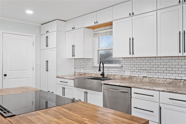 kitchen with dishwasher, sink, tasteful backsplash, crown molding, and white cabinets