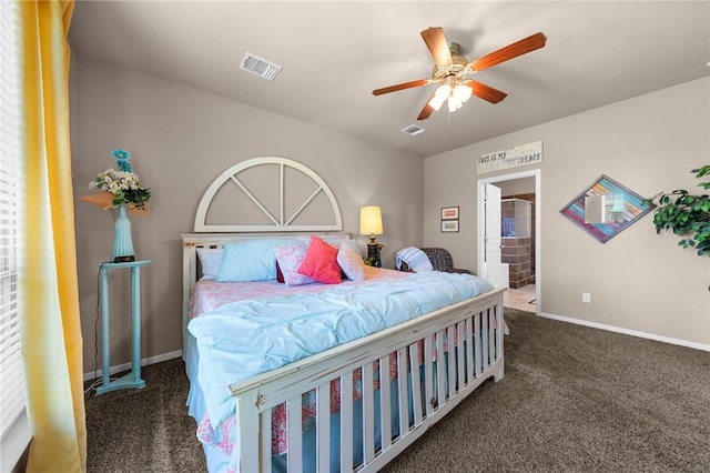 bedroom featuring ceiling fan, dark colored carpet, visible vents, and baseboards