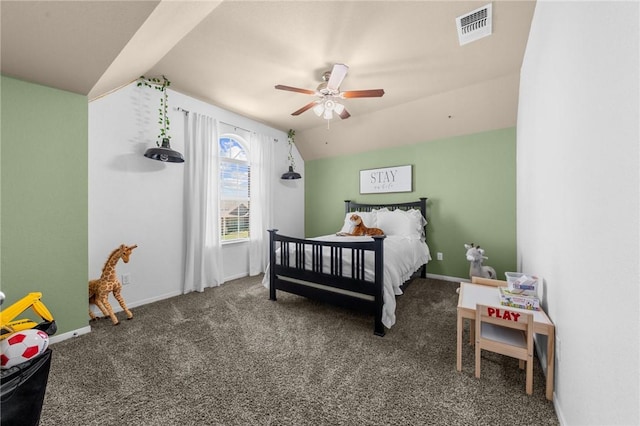 bedroom featuring ceiling fan, visible vents, baseboards, vaulted ceiling, and dark carpet