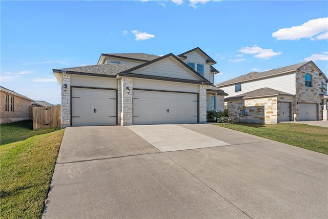 view of front facade with a garage and a front yard