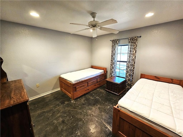 bedroom with recessed lighting, concrete floors, and a ceiling fan