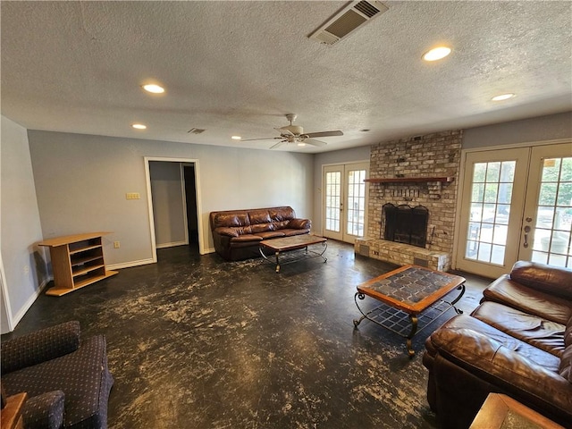 living area featuring visible vents, recessed lighting, french doors, and baseboards