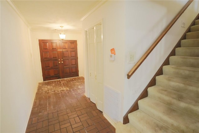 foyer with ornamental molding