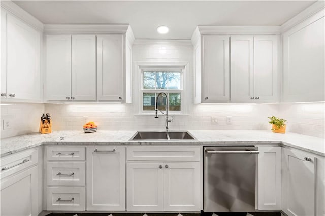 kitchen with white cabinetry and sink