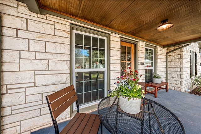 view of patio featuring a porch