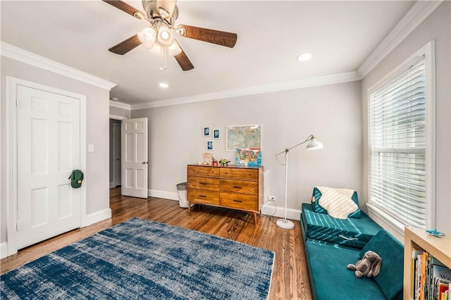 interior space with ceiling fan, crown molding, and dark wood-type flooring